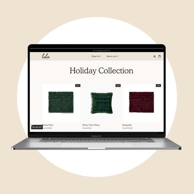 Lola Blakets homepage on a laptop