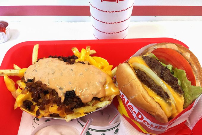 Two of their most popular menu items are the "Double-Double" hamburger - two hamburger patties with two slices of cheese, and the "Animal Style" french fries - two slices of melted cheese, spread, and grilled onions on top.