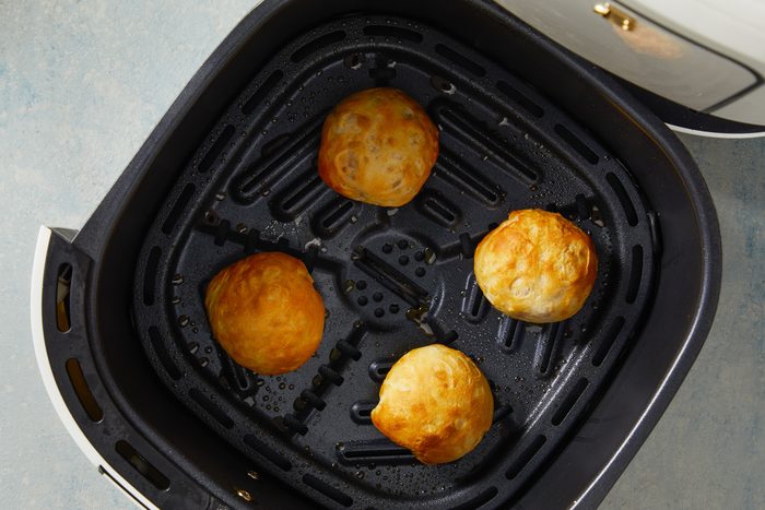 cooked golden brown apple bombs