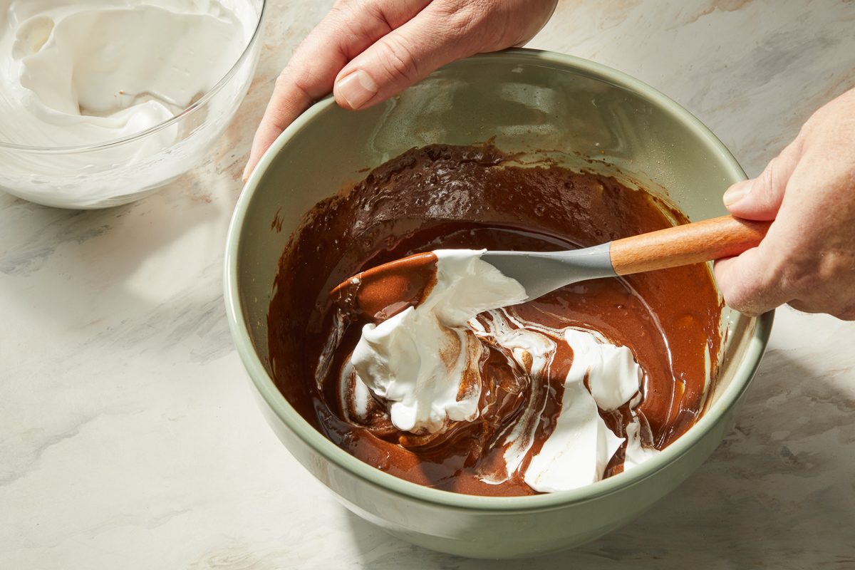 folding in egg white mixture with batter